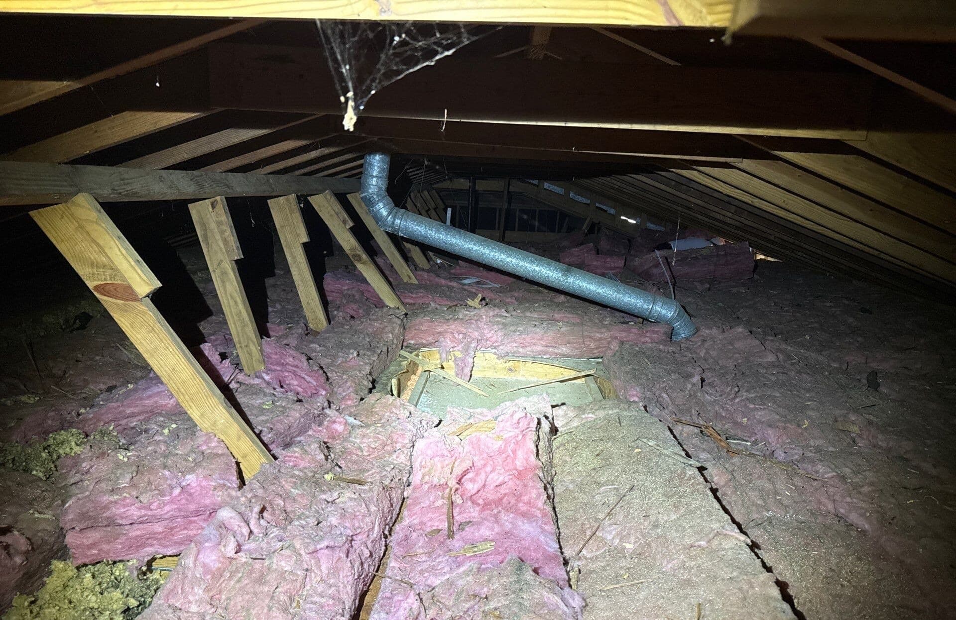 Attic insulation installation — before